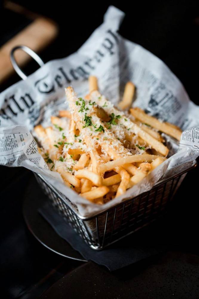 golden crispy french fries in basket